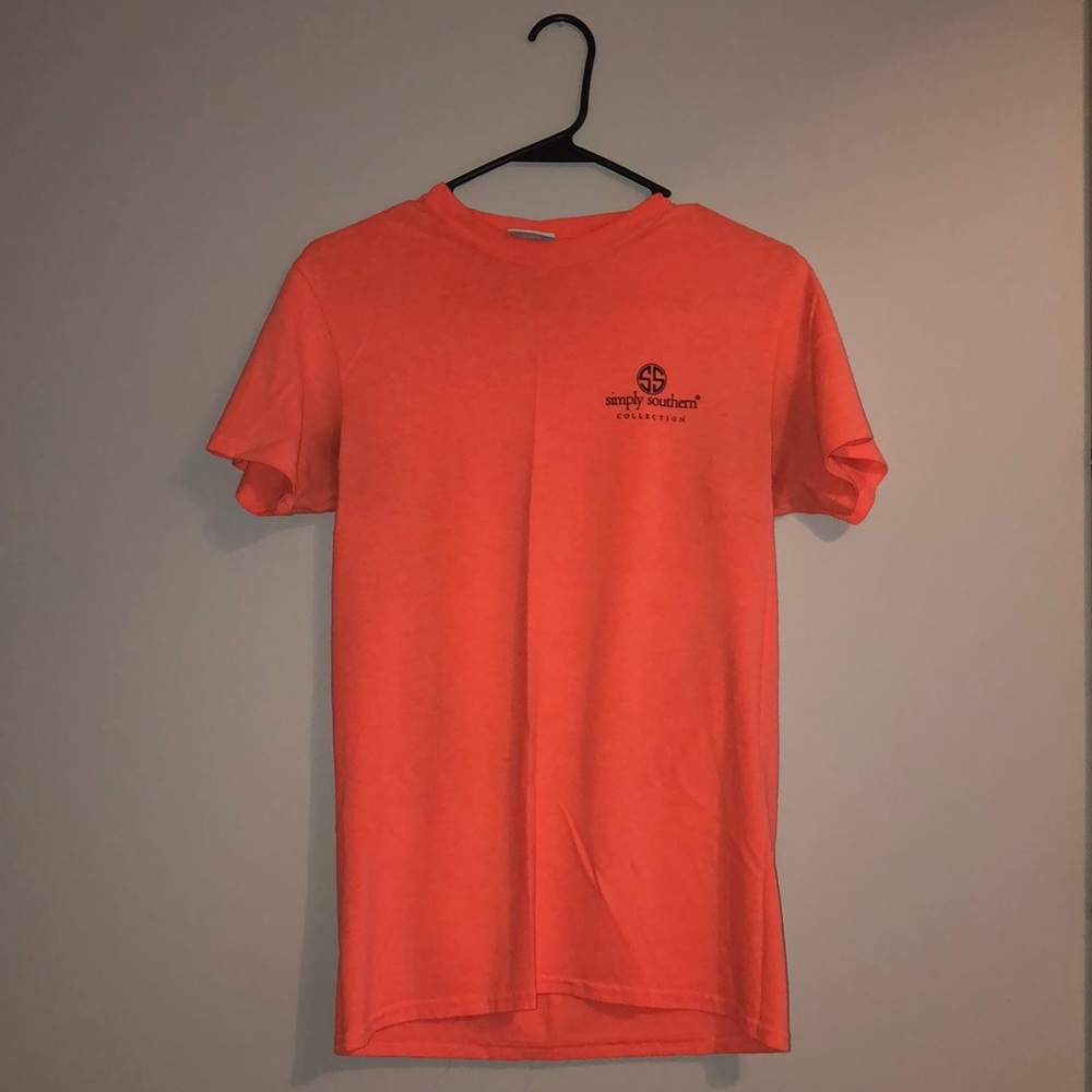 Bright peach colored Simply Southern shirt